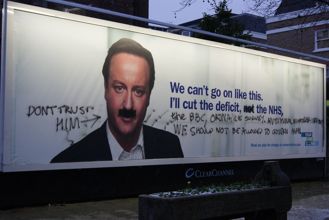 david cameron poster graffiti